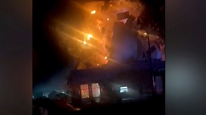 Domino's restaurant explodes after car crashes into building