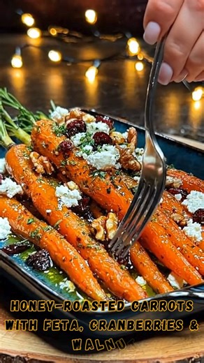 🥕 Honey-Roasted Carrots with Feta, Cranberries & Walnuts | Protein: 9g Sweet, savory, and beautifully caramelized — these **Honey-Roasted Carrots with Feta, Cranberries & Walnuts** are the perfect balance of flavors and textures! 🍯✨ Tender roasted carrots drizzled with honey, topped with tangy feta, crunchy walnuts, and sweet dried cranberries — a show-stopping side dish for any occasion! 💛🌿 📝 Ingredients: ✦ 1 lb whole carrots, peeled and trimmed ✦ 1½ tbsp olive oil ✦ 1 tbsp honey or maple 