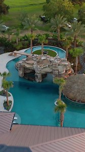 One of our most Insane Pool builds to date. This pool is over 200 thousand gallons and has a 150 foot lazy river and a hot tub inside the grotto. What do you think? #insanepools #lucaslagoons #pool #poolbuilders #backyard #insane #lazyriver | Lucas Lagoons Design
