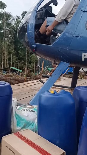 Exploring a Helicopter in a Forested Settlement
