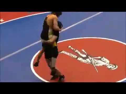 Girl Slams Boy in Wrestling Match