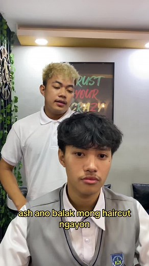 Trendy Mid Taper Haircut with Textured Fringe at Jack of Fades Barbershop