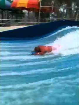 boy loses shorts and keeps riding flow rider!!! Funny!!