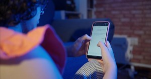 Young A Woman Using Generative Artificial Intelligence Software