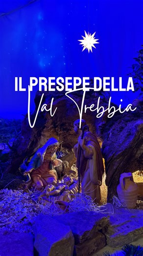 Lo sai che esiste un Presepe ambientato in Val Trebbia? Si trova nella chiesa di Bassano, nel Comune di Rivergaro. La particolarità è lo scenario: non un luogo generico, ma la Val Trebbia stessa, riconoscibile nei suoi paesaggi più iconici. Sul fondo si distinguono il Monte Penice, Bobbio e il Ponte Gobbo. Il fiume attraversa la valle dando vita alle attività agricole e pastorali: allevamenti, animali, uno stagno con le oche. Troviamo le cime della Parcellara e della Perduca con l’Oratorio di Sa