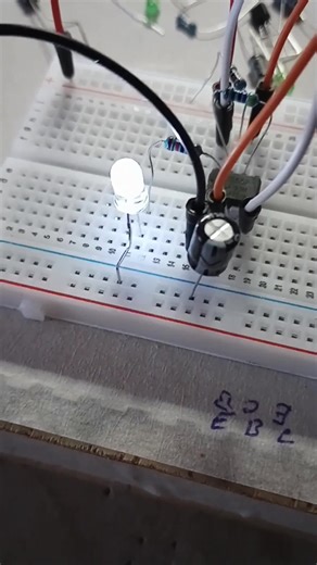 I built this circuit I wanted for one of my projects... in the dark it will do the job it's a flashing LED circuit on and off it's powered in this picture with 12.5 V from my power supply....it will operate on 5.0 V USB style also but the LED will be slightly dimmer. From the breadboard the working circuit can be transferred to a circuit board and components permanently soldered. Judy it for the W project.😹 | Paul Anthony Harris