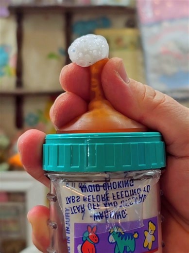Squeezing the air out of the Playtex Nurser from the 90s. Do you remember these bottles?