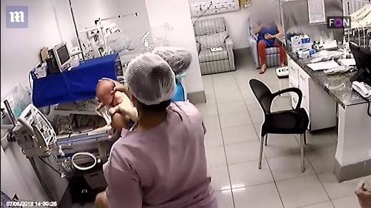 Horrific moment baby girl plunges head first from ICU incubator