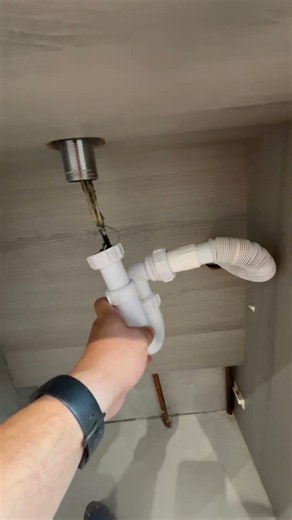Basin waste (clogged up with hair)