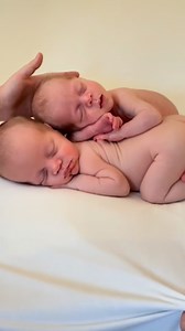 If you’ve worked in newborn photography or had a newborn photoshoot you will understand the tension that the dummy pull moment causes. #photographer #portraitphotographer #newbornphotographer #twins | Gillard Studios - Portrait Photography Studio
