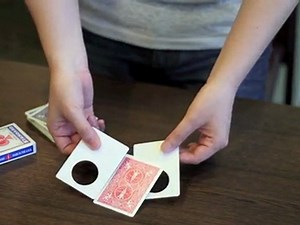 :: SansMinds :: Holely Change Magic Trick