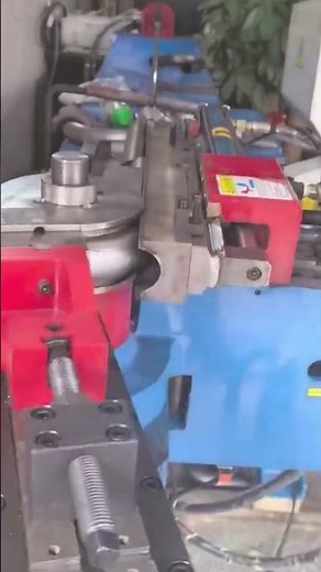 the process of bending an iron rod using a special tool