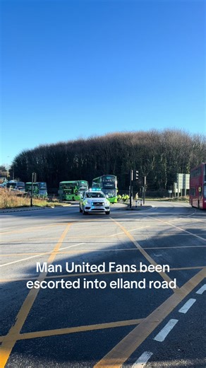 Man United fans been escorted into elland road by the shuttle buses
