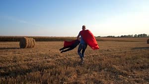 Free Video Stock superheros playing in a field Live Wallpaper