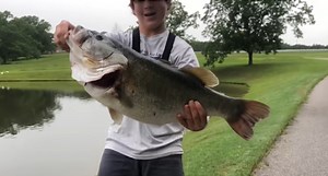 Young Angler Freaks Out After Catching 15-Pound Bass on Camera