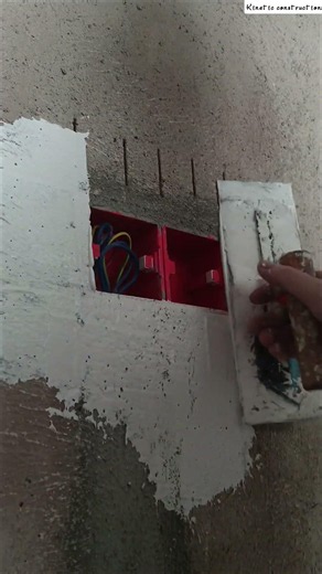 🛠️🧱 Rectangular Masonry Trowel Smoothly Applying Wall Putty Around Switch Box
