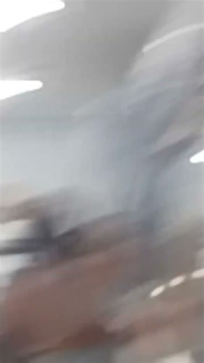 Why are 2 monitors running Windows 10???