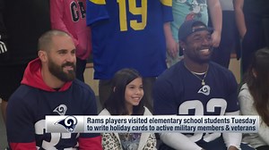 Rams visit elementary school students to write holiday cards to active military members, veterans