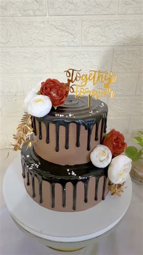 Baking Lab | Two tiers of chocolate elegance, finished with deep ganache drips and romantic florals 🤍✨ Rustic charm with a modern love story on top... | Instagram
