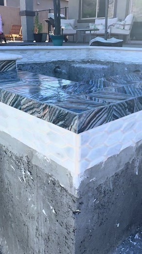 Pretty unique pool tile. What do you think? #pools #tile #custompools #satisfying #luxurypools