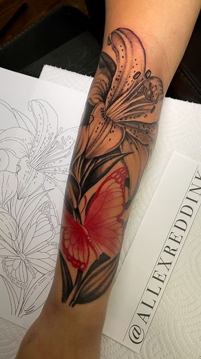 R E D B U T T E R F L Y . .did these Lily and red butterfly tattoo for a client working on her sleeve #tattoos #tattooartist #tattooideas #explore #trendingnow | Allex Redd Ink