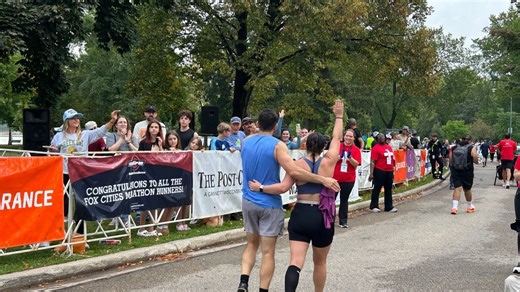 Winners of Fox Cities half marathon cross the finish at 8:15, 8:20