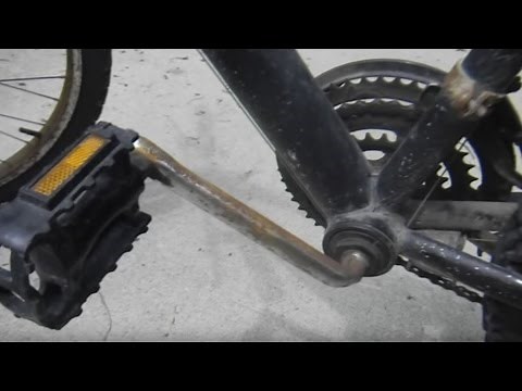 How to Take Apart a One Piece Crank Bottom Bracket on a Bicycle