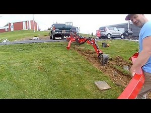 Beginner with towable backhoe digging for a sidewalk: attached and detached. Clearly NOT a tutorial!