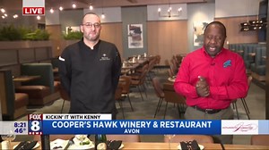 Kenny checks out the menu at Cooper's Hawk Winery & Restaurant in Avon