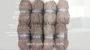 In this video we show how to arm knit a blanket. We have used 2 strands of DROPS Polaris and cast on 29 sts. Knit 15-17 rows (depending on your gauge). Cast off, cut and fasten threads. You can make a blanket under an hour! Have you arm knitted a blanket? Show us with a photo here on Facebook! Press the HD button right on the video menu to see the video in high resolution. If you have a question regarding this video, please leave it here: http://www.garnstudio.com/lang/en/video.php?id=608 There 