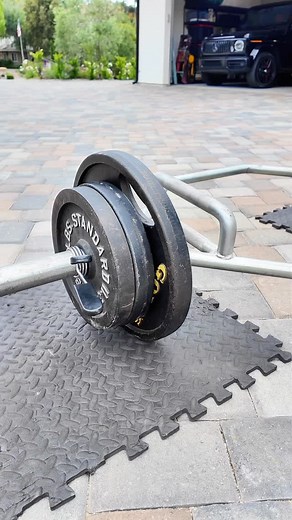 “Rest day” Had to get outside and throw down some farmer carry’s. These are great for core, forearms, traps, back, legs, heart rate, neck, fingers, ankles, mental health, wealth creation, sustainable agriculture, perky glutes. #buymyprogram 😂 | Taylor Thrasher