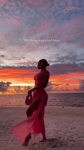 Serene Beach Walk at Sunset in a Pink Dress