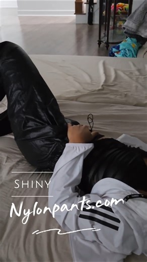 Windpants women - shiny nylon swishy pants - Nike Adidas wetlook videos - sauna suit rainwear