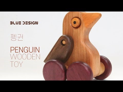 Make a wooden toy penguin with moving wings