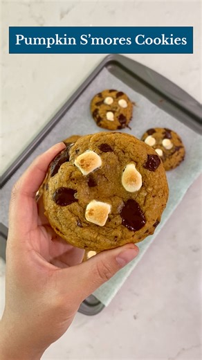These soft-baked pumpkin s'mores cookies are the perfect combination of summer campfires and fall harvest. Full recipe here: bit.ly/3yOVAXk | Taste of Home