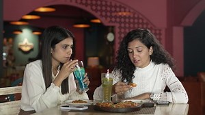 Smiling Two Indian Girl Friends Eating Stock Footage Video (100% Royalty-free) 1096878355 | Shutterstock