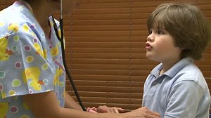 Female Nurse Gives Young Boy Checkup Stock Footage Video (100% Royalty-free) 1936912 | Shutterstock