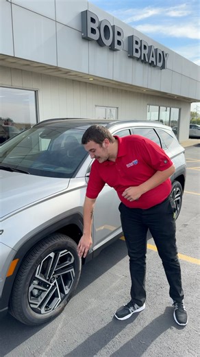 🚙✨ Walkaround Wednesday with Rambo ✨🚙 Rambo’s taking a closer look at the 2026 Hyundai Tucson Limited AWD in Shimmering Silver. Sleek, modern, and packed with advanced tech — this SUV is built to shine on every road. 🌟 Come see it for yourself at Bob Brady Auto Mall — where style meets capability. 💙 | Bob Brady Auto Mall