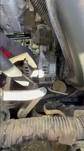 Mazda alternators come out with the bolt. #mazda #alternator #fix #removal #505 #replacement #mazda3