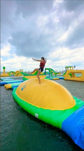 Who can make it across without SLIPPING? 😱 (world's BIGGEST inflatable water park!)