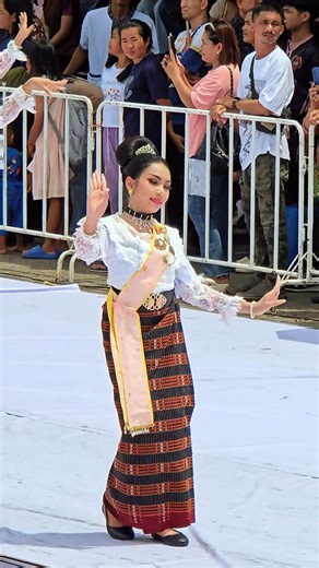 Beautiful Isan Traditional Dance in the Parade of the 2025 Ubon Ratchathani Candle Festival in July . The Ubon Ratchathani Candle Festival is held annually in July or August to commemorate the Buddha's first sermon and to mark the beginning of Buddhist Lent. The highlight of this annual event is the parade of giant wax sculpture floats that travel through the city, each representing a local temple, district, or institution. . Credit: sakonnakhoncity | Thai Culture to the World