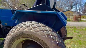 Long 2460 Tractor w/ 2400 QT BushHog Brand loader w/ bucket; Tractor currently showing 1,836 hours; Tractor has 4 Speed w/ high & low transmission, power steering, has live power PTO comes with draw bar and third arm. Tractor has one set of hydraulic remotes, roll bar & turf tires. According to Tractor Data the model has 41.9 PTO HP & has a 2.3 L 3-cyl diesel engine. Loader is somewhat slow, but works - see video. BIDDING LINK: https://goldenruleauction.hibid.com/lot/152343138/long-2460-tractor-