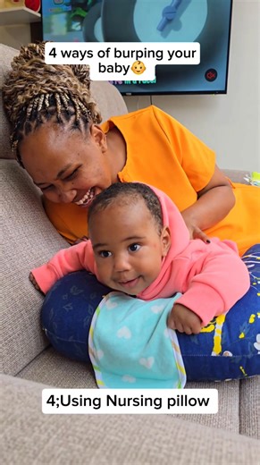 Ways of burping a baby. 1;Over your shoulder With your baby's chin resting on your shoulder, support the head and shoulder area with one hand, and gently rub and pat your baby's back. 2; Lying across your lap Lie your baby across your lap face down. Supporting their chin (do not put any pressure on the throat area), use your free hand to gently rub or pat your baby's back 3; Just like tummy time,place your baby over a nursing pillow lying across and rub your baby's back gently to burp. 4;Lying a