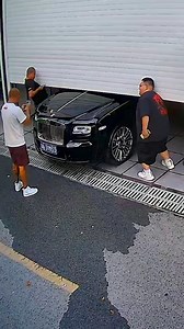 Trying to lift the garage door from the car | Handy Dandy