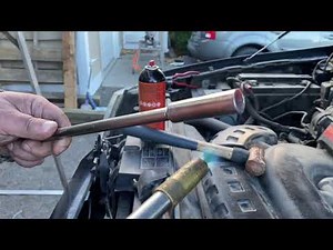 Trick to remove a rounded spark plug in a deep hole