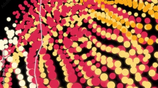 Swirling streams of red and yellow illuminated particles flow dynamically across the dark.