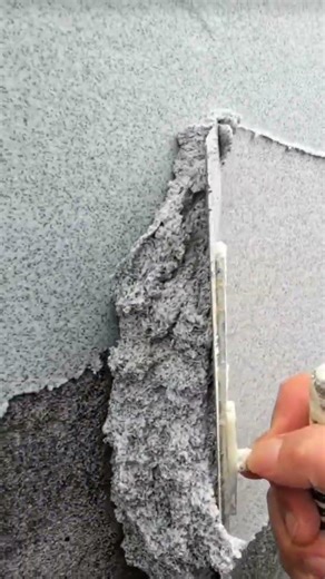 the process of plastering sand powder mixture on the walls of a building #construction #viralshorts