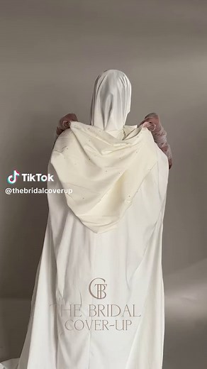 New detatchable hoods available for our Cover ups. Featuring a new addition. Stay Tuned. #bride #bridal #summerbride #bridetobe #nikkahbride #nikkahbridemakeup #nikkahabaya #walima #katbkitab #whitedress #hijabibride #weddingdress #somalitiktok #coverup #hijab #arabbride #bridalcoverup #bridalcape #somalibridal #fyp