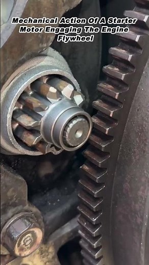 Mechanical Action Of A Starter Motor Engaging The Engine Flywheel