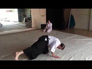 How to do an Aikido backward roll (ushiro ukemi) from standing